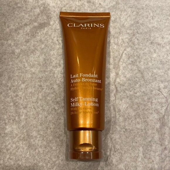 Brand new sealed Clarins Self-Tanning Milky Lotion with fig extract 24-hr